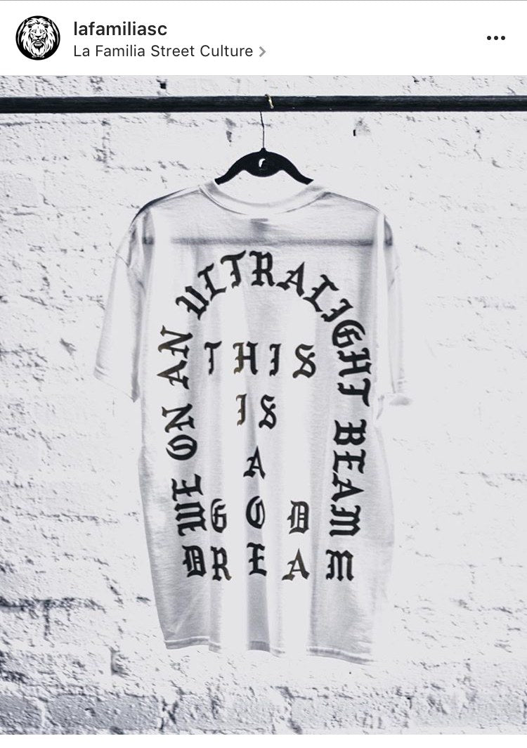 Pablo 'We on an ultralight beam' T-shirt on a hanger at La Familia Street Culture, Sandton, Instagram @lafamiliasc, September 2016