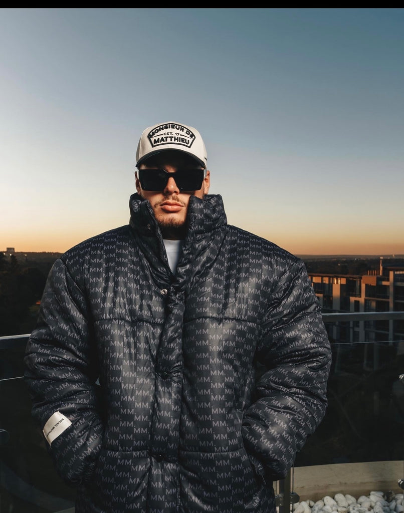 Micael Matthew's Noir "MM" Monogran Puffer Jacket