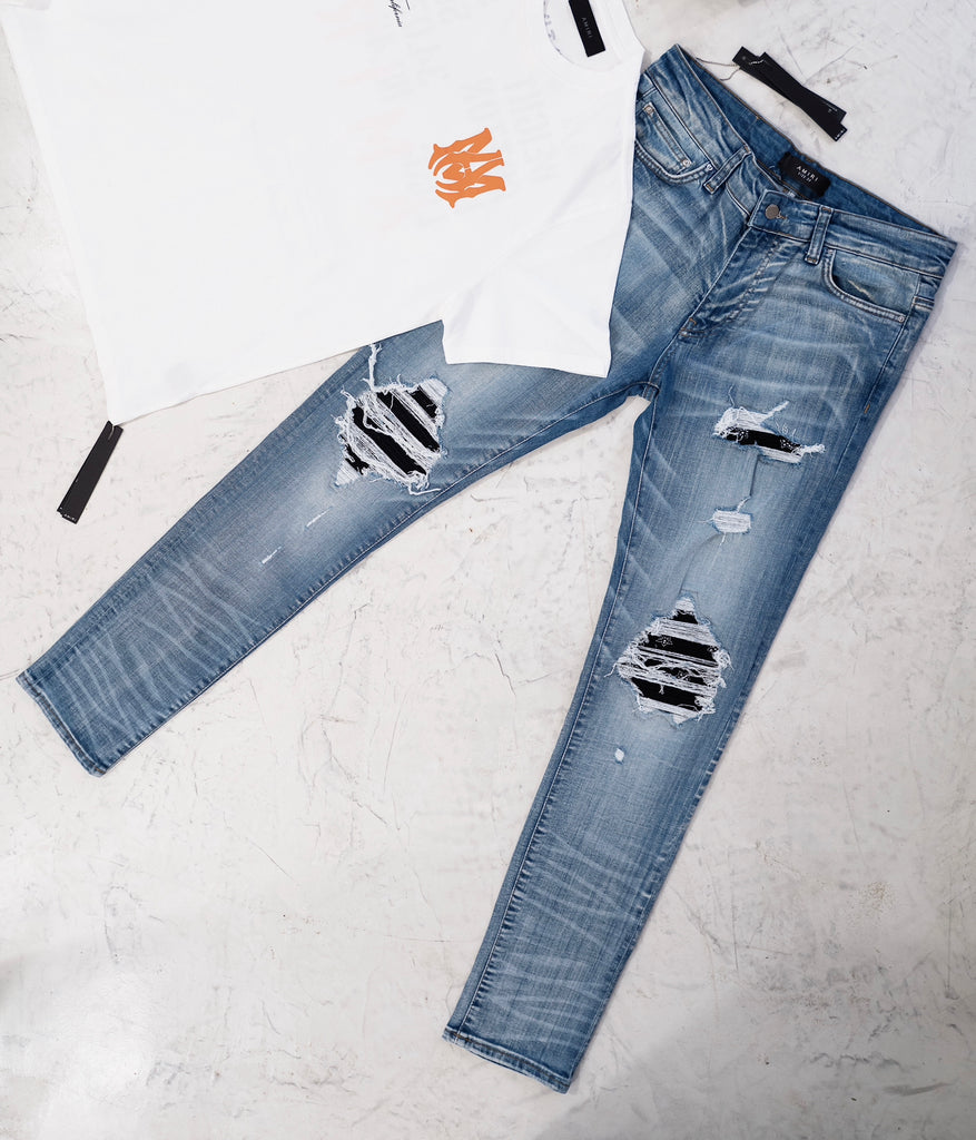 Amiri MX 1 leather patch jeans - La Familia Street Culture